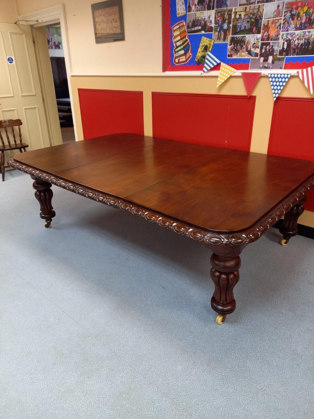 Victorian wind-out table polished