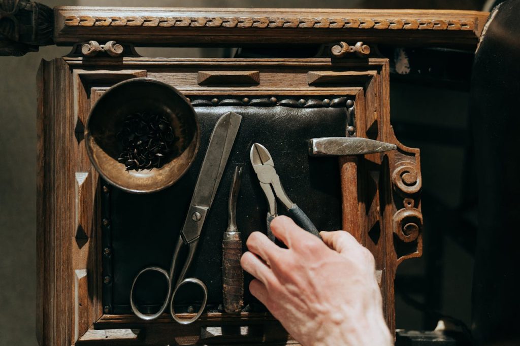 Person Holding Black Handled Scissors