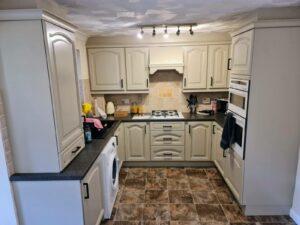 Resprayed cathedral-style kitchen doors in Boston