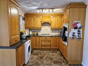 Cathedral-style kitchen doors in Boston before respraying